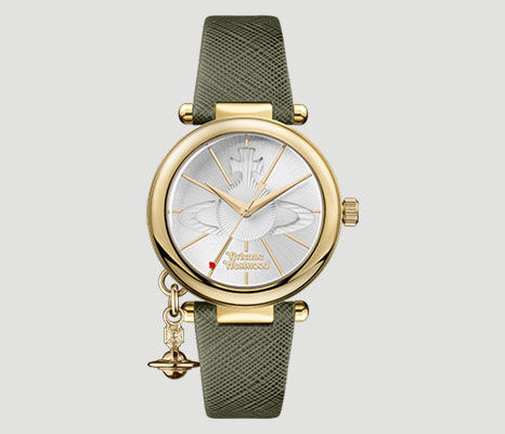 Vivienne Westwood Orb watch with gold case and olive-green leather strap, featuring signature orb charm detail.